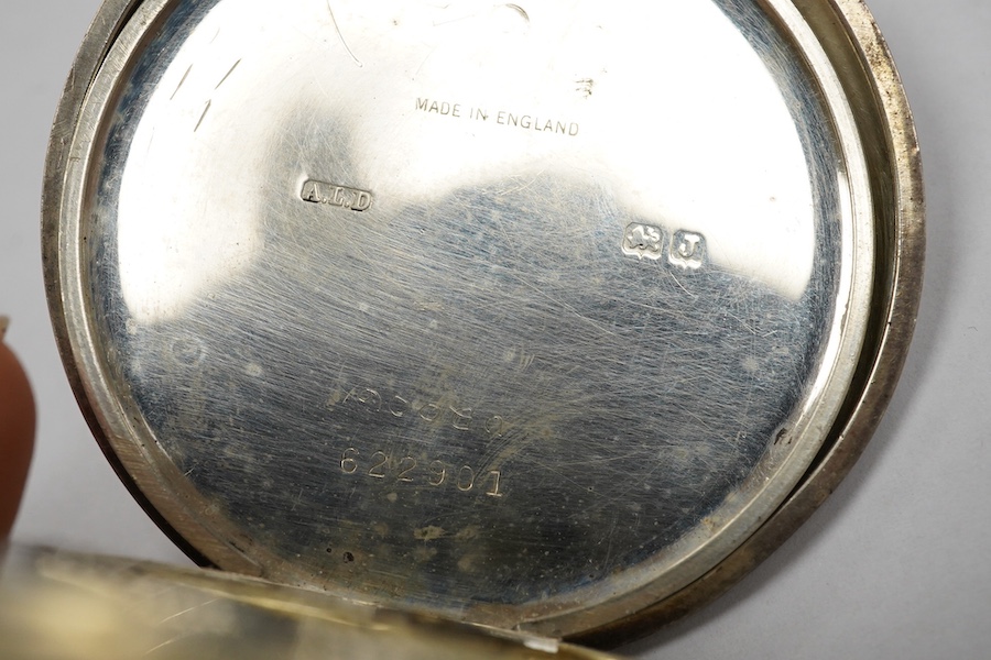 A George V silver J.W. Benson keyless half hunter pocket watch, with Roman dial and subsidiary seconds, case diameter 49mm. Condition - poor to fair